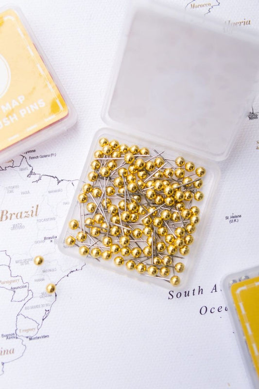 50 PINS DORADOS